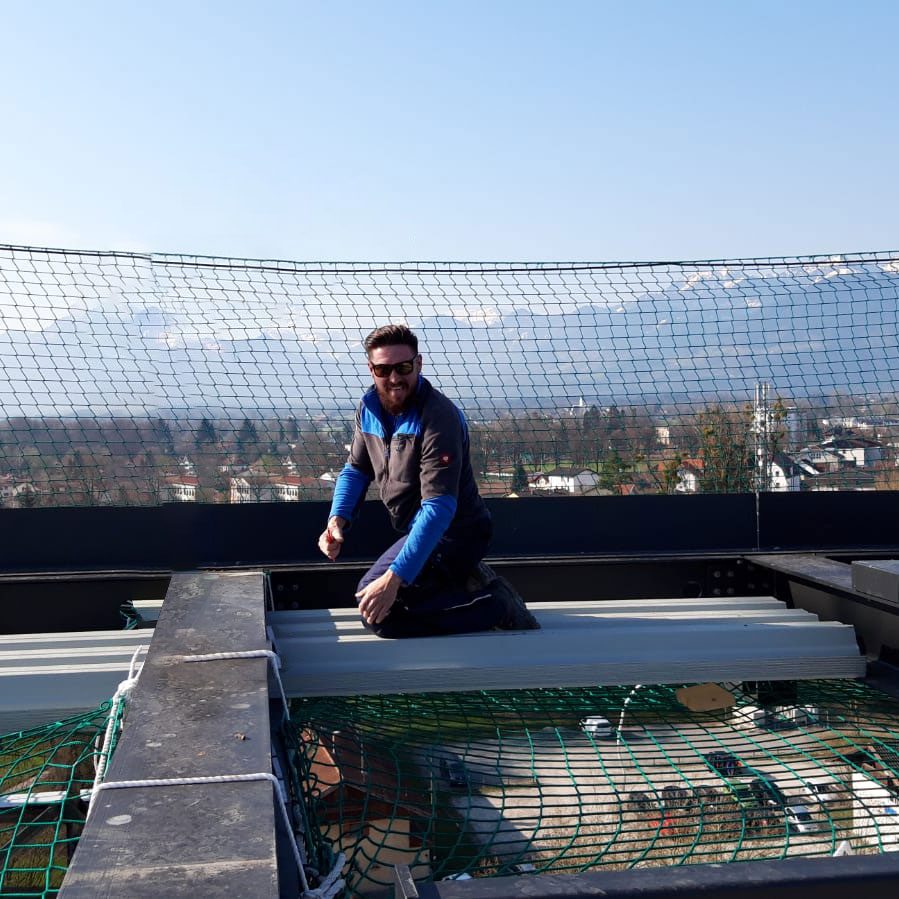 Adam Rückert auf Dachkonstruktion